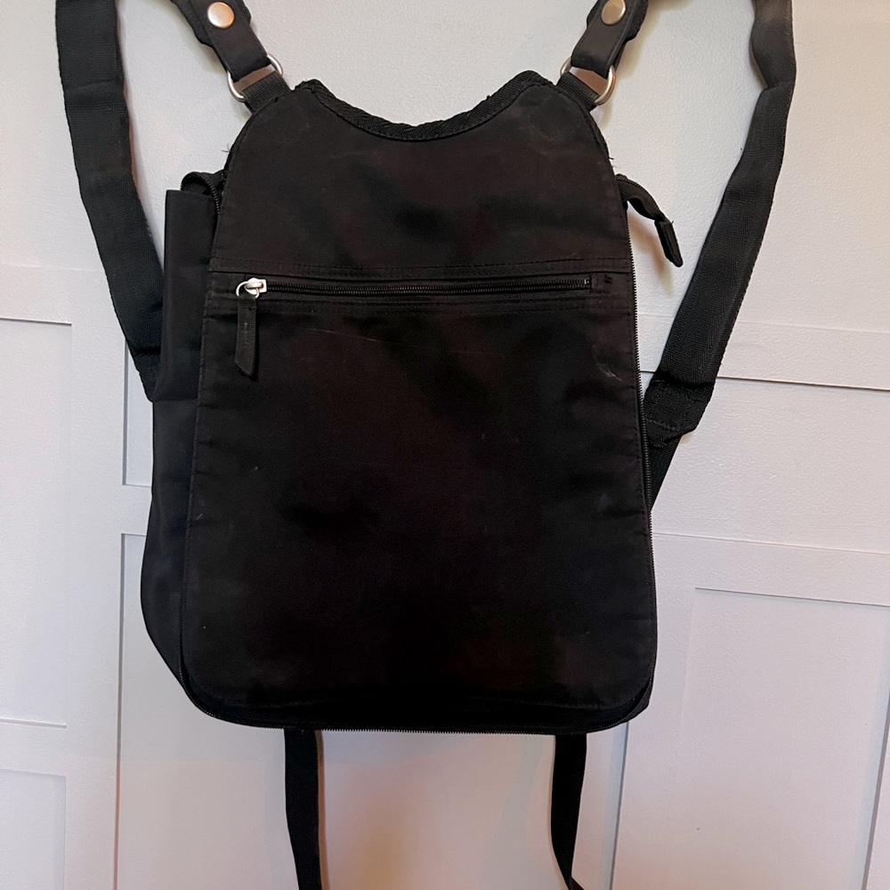 Hana D Berkeley black slim, expandable backpack.